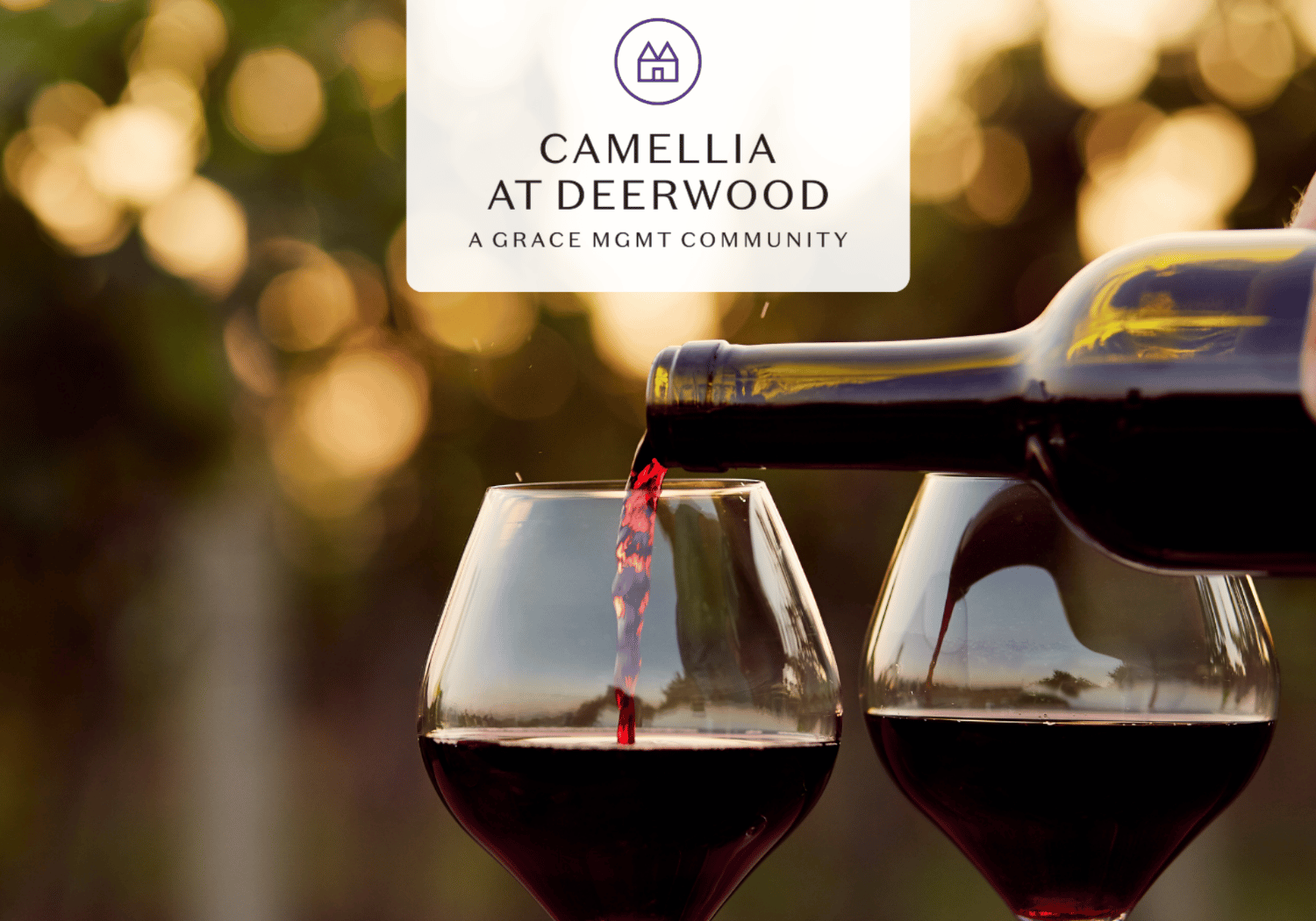 Wine being poured into two glasses of red wine, with a logo card that reads 'Camellia at Deerwood' above.